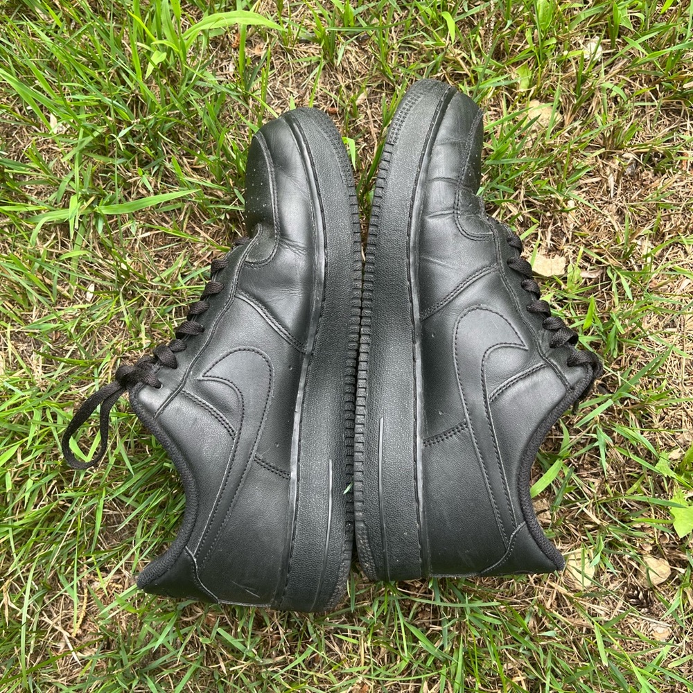 Nike black Air Force 1s, men’s size 12 in fair condition.